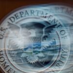 US Department of Homeland Security says it is probing a cyber breach at information-sharing network