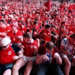 Viking enthusiasts hail spirit, if not technique, of Norway fans’ “Viking row”