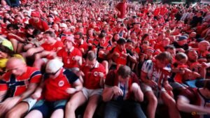 Viking enthusiasts hail spirit, if not technique, of Norway fans’ “Viking row”