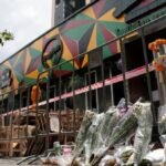 Woman dies week after Bangkok bar fire, raising toll to 34