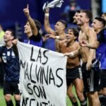 Argentine players brandish political Falklands flag after England match