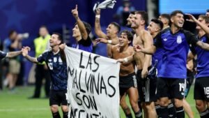 Argentine players brandish political Falklands flag after England match