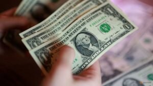 Dollar stabilises above one-month low as traders focus on inflation risks