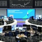 Chipmakers chip away at stocks, oil hovers at $85