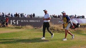 Burns starts final day of Open with two-shot lead