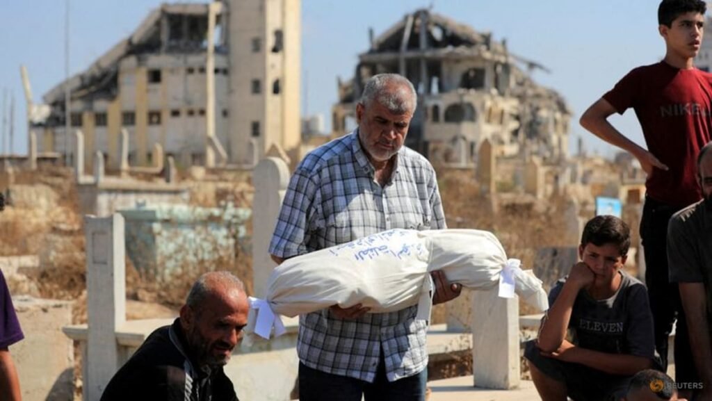 Gaza civil defence says Israeli strikes kill 12, including family of six