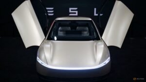 Tesla cash burn to test investor faith in AI bets
