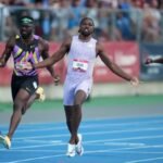 Lyles slams door on 100m field at US Championships