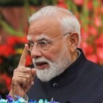 India PM Modi announces panel to overhaul exam system after protests