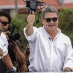 Honduras ex-president Hernandez returns home after Trump pardon