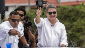 Honduras ex-president Hernandez returns home after Trump pardon