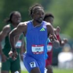 Lyles eases injury fears after cramp halts 200m run