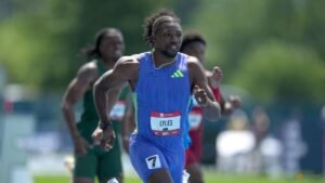 Lyles eases injury fears after cramp halts 200m run