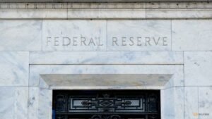 US Federal Reserve holds rates steady as inflation hawks call for hike