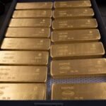 Gold edges lower ahead of Fed decision on interest rates