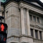 BOJ keeps rates steady, delivers hawkish signal as government props up yen