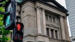 BOJ keeps rates steady, delivers hawkish signal as government props up yen