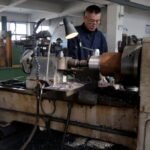 China’s factory activity unexpectedly shrinks in July as demand sags