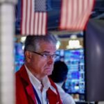 Wall Street gains on tech earnings; bond yields hit multi-year highs