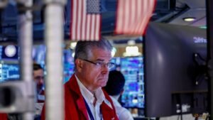 Stocks boosted by tech earnings; bond yields hit multi-year highs