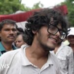 Protesters celebrate resignation of India’s education minister