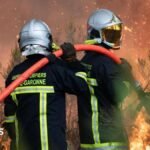 Wildfire threatens Bordeaux as more than 300,000 leave homes in France and Spain