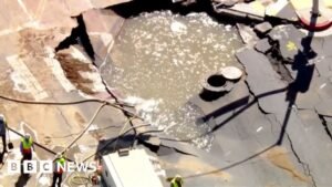 Watch: Sinkhole and flooding in Los Angels after burst water pipe