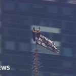 Two people climb to top of NYC’s Empire State Building