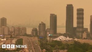 Orange haze from Canada wildfires seen in Ontario and northern US
