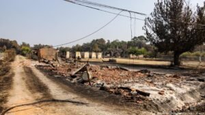 Spain lets wildfire evacuees return, severe heat hits France