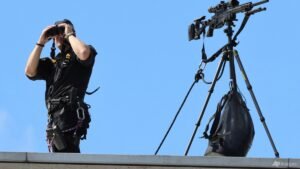 Scottish police arrest 15 after anti-migrant protest clashes