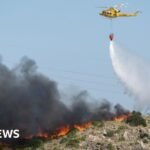 Spain battles to contain one of its deadliest wildfires as at least 12 killed
