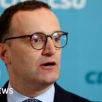 German politician resigns over surrogacy child controversy