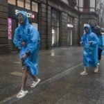 Typhoon Dolphin weakens but disrupts travel in east China