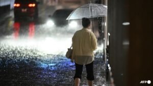 Record rain in Japan kills four, leaves thousands stranded at Narita airport