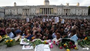 Thousands mourn dead black academic in London vigil