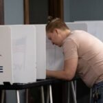 Democrats’ battle between progressive and moderate in Wisconsin governor’s race too close to call
