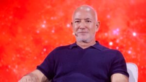 Group including Jeff Bezos buys minority stake in Liverpool FC, with option to become controlling owner