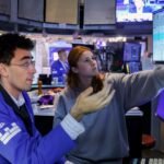 AMD and Sandisk are two of the big chip stocks with earnings momentum in the new week