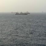 Tankers near Oman come under fire as Iran threatens to choke off shipping routes