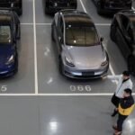 Millions of Teslas recalled in China over door handle safety