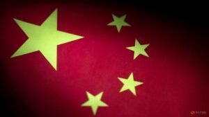 China conducts naval, air patrols around disputed shoal in South China Sea