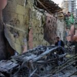Russia pounds Kyiv with missiles, killing at least nine
