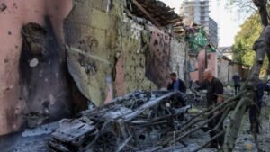 Russia pounds Kyiv with missiles, killing at least nine