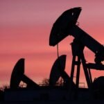 Oil slides, stocks rise on hopes of deal to end Middle East war