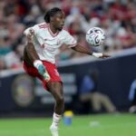 Liverpool boss Iraola downplays Frimpong injury concerns