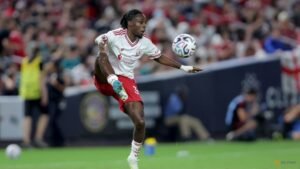 Liverpool boss Iraola downplays Frimpong injury concerns