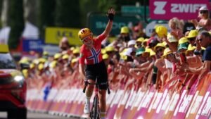 Norway’s Haugset rides to solo win, takes yellow jersey in Tour de France Femmes