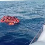 Rescuers comb waters near Bali for 5 missing after ferry blaze