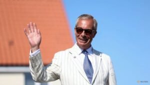 Nigel Farage regains UK parliamentary seat, fights off Count Binface challenge